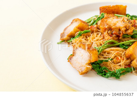 Stir-fried rice vermicelli and water mimosa with crispy pork belly Stir-fried rice vermicelli and water mimosa with crispy pork belly 104855637