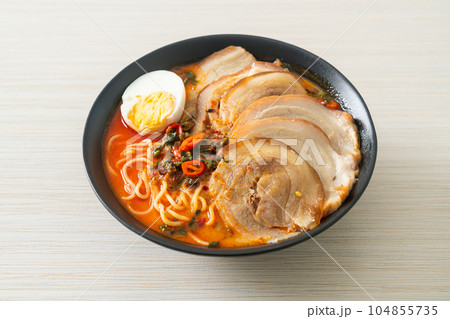 Ramen Noodles Spicy Tomyum Soup with Roast Pork Ramen Noodles Spicy Tomyum Soup with Roast Pork 104855735