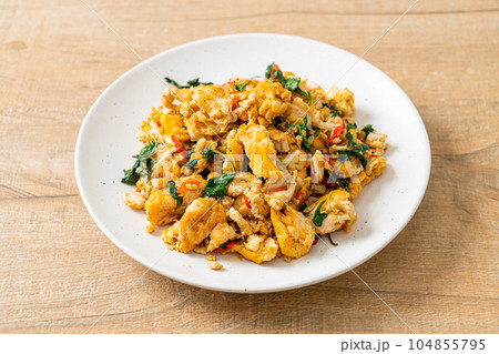stir-fried egg with Thai basil and chilli stir-fried egg with Thai basil and chilli 104855795