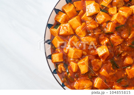 Mapo Tofu - The traditional Sichuan dish of silken tofu and ground beef, packed with mala flavor from chili oil and Sichuan peppercorns. Mapo Tofu - The traditional Sichuan dish of silken tofu and ground beef, packed with mala flavor from chili oil and Sichuan peppercorns. 104855815