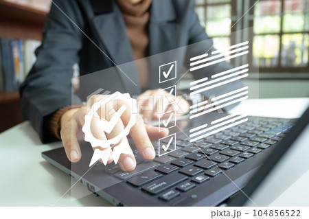 Businesswoman showing the symbol of top service 5 star quality assurance, excellent warranty, world standard, ISO certification, development and improve the quality of the organization concept. 104856522