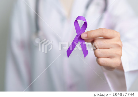 purple Ribbon for Violence, Pancreatic, Esophageal, Testicular cancer, Alzheimer, epilepsy, lupus, Sarcoidosis and Fibromyalgia. Awareness month and World cancer day concept purple Ribbon for Violence, Pancreatic, Esophageal, Testicular cancer, Alzheimer, epilepsy, lupus, Sarcoidosis and Fibromyalgia. Awareness month and World cancer day concept 104857744