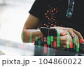 closeup man using smart phone with candle stick graph and dollar sign 104860022