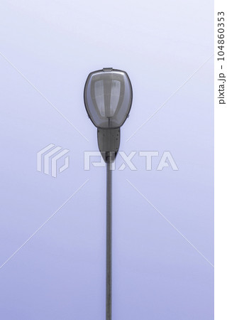 Street lamp post on blue sky background 104860353