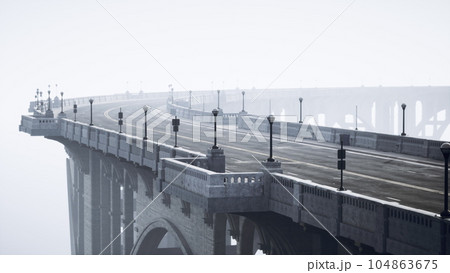 Old empty bridge on a foggy day 104863675