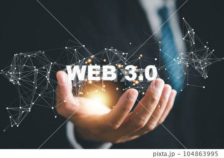 A visionary businessman in a suit represents the cutting edge Web 3.0 concept, epitomizing the fusion of technology, internet connectivity, and business evolution. Web3 104863995