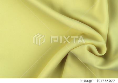 Yellow color fabric cloth polyester texture and textile background. Yellow color fabric cloth polyester texture and textile background. 104865077