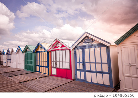 Colorful beach huts in Cayeux, Normandy, France Colorful beach huts in Cayeux, Normandy, France 104865350