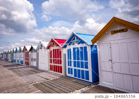 Colorful beach huts in Cayeux, Normandy, France Colorful beach huts in Cayeux, Normandy, France 104865356