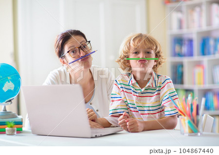 Online remote learning. School kids with computer. 104867440