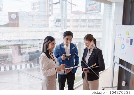 Diverse Business people advisor. Business team of financial analysis about company's graph profit. finance, strategy, meeting concept 104870252