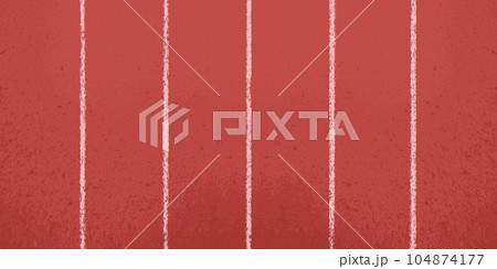 Top view of the red rubber surface of the running track Top view of the red rubber surface of the running track 104874177