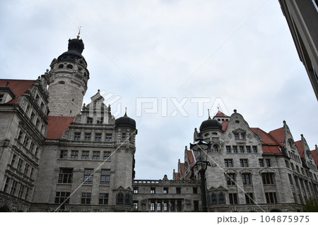 Low angle shot of New City Hall in Leipzig, Germany against a cloudy sky Low angle shot of New City Hall in Leipzig, Germany against a cloudy sky 104875975