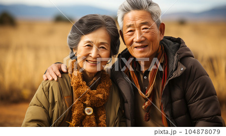 Smiling Japanese husband and wife, married couple in the nature background, traveling 104878079