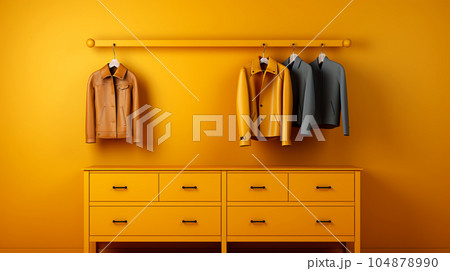 Yellow closet for clothes and shoes, closet, hallway indoors with yellow background, minimalist and retro style 104878990