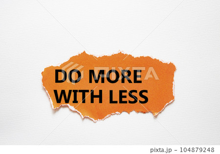 Do more with less symbol. Concept words Do more with less on torn orange paper. Beautiful white background. Business and Do more with less concept. Copy space. Do more with less symbol. Concept words Do more with less on torn orange paper. Beautiful white background. Business and Do more with less concept. Copy space. 104879248