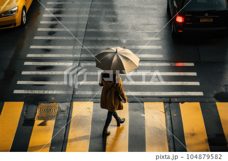 the person walking down the street the person walking down the street 104879582