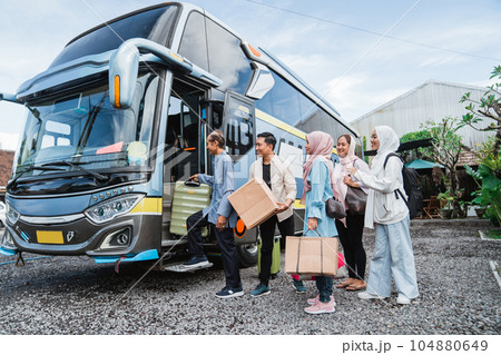muslim passengers going on bus road trip for eid mubarak muslim passengers going on bus road trip for eid mubarak 104880649