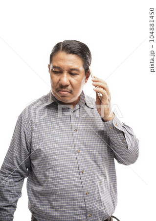 old asian man talking on phone with annoyed face in white background 104881450