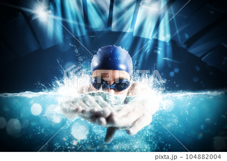 Sporty woman athlete swims with energy during a competition in the pool 104882004