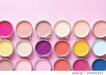 Many different colored tin cans. House rennovation, design ideas, bright conceptual photo. High quality photo with copy space. Pink, yellow, blue, magenta, orange, pastel beige paint. AI generated 104882921