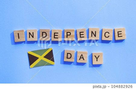 August 6, Jamaica Independence Day, a minimalistic banner with the inscription in wooden letters 104882926