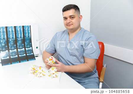 Medical consultation, spinal X-ray, Medical examination, Doctor's visit, Healthcare consultation, Consultation for spinal radiography,examining patients xray result Medical consultation, spinal X-ray, Medical examination, Doctor's visit, Healthcare consultation, Consultation for spinal radiography,examining patients xray result 104885658