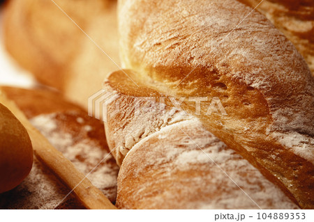 Macro shot of freshly baked bread loaf Macro shot of freshly baked bread loaf 104889353