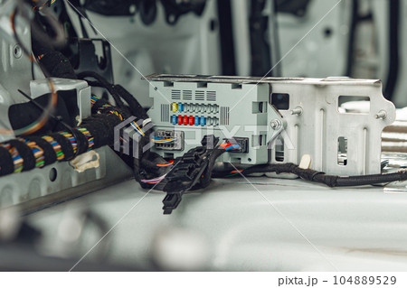 Electric wiring system with colorful wires in the car Electric wiring system with colorful wires in the car 104889529