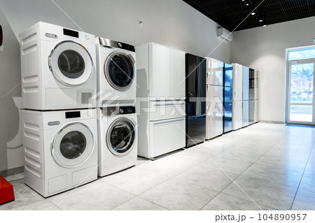 Washing machines and drying machines home appliance retail store showroom Washing machines and drying machines home appliance retail store showroom 104890957