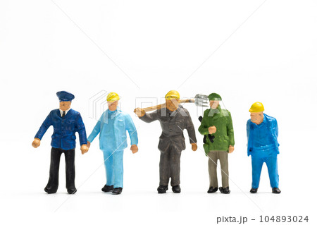 Miniature people different professions standing on white background , Labour day concept 104893024
