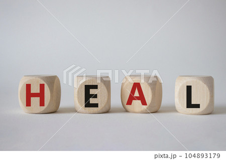 Heal symbol. Concept word Hate on wooden cubes. Beautiful white background. Healthcare and Heal concept. Copy space. Heal symbol. Concept word Hate on wooden cubes. Beautiful white background. Healthcare and Heal concept. Copy space. 104893179