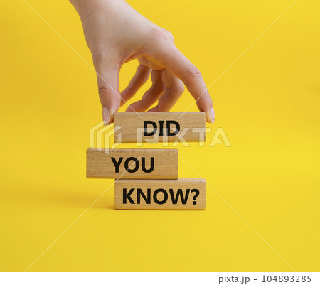 Did you know symbol. Wooden blocks with words Did you know. Businessman hand. Beautiful yellow background. Business and Did you know concept. Copy space. 104893285