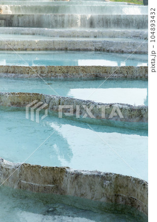 Travertines mountains of Pamukkale in Turkey. Travertines mountains of Pamukkale in Turkey. 104893432