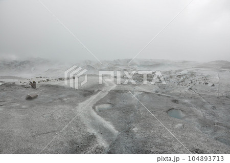 Falljokull glacier in the fog in Iceland Falljokull glacier in the fog in Iceland 104893713