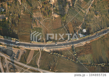 Aerial view of the road between Cavusin and Goreme in Cappadocia, Turkey Aerial view of the road between Cavusin and Goreme in Cappadocia, Turkey 104893726