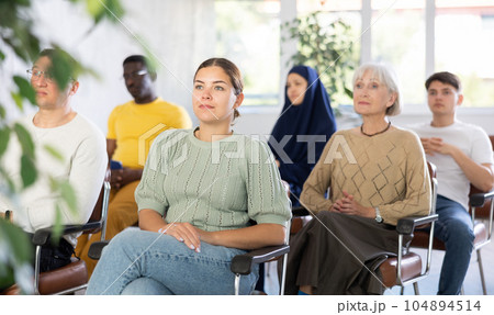 Young woman visiting seminar during educational classes Young woman visiting seminar during educational classes 104894514
