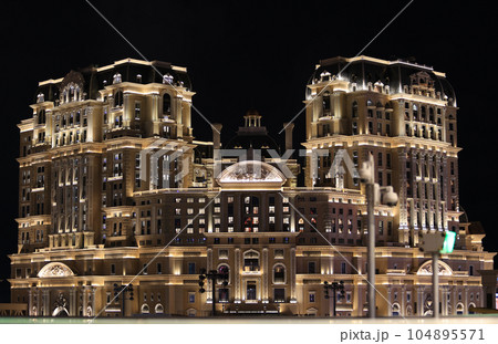 exterior of Grand Lisboa Palace at night. it is the newest casino and hotel in Macau exterior of Grand Lisboa Palace at night. it is the newest casino and hotel in Macau 104895571