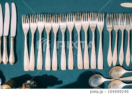 Vintage Forks On Tablecloth. Kitchenware. Set Of Old Kitchen Utensils. Old Crockery Concept. Fork Set. Vintage Silverware Vintage Forks On Tablecloth. Kitchenware. Set Of Old Kitchen Utensils. Old Crockery Concept. Fork Set. Vintage Silverware 104899246