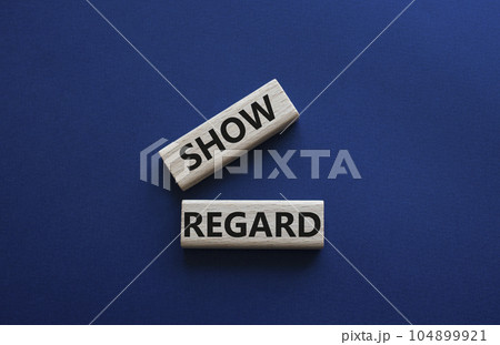 Show regard symbol. Wooden blocks with words Show regard. Beautiful deep blue background. Business and Show regard concept. Copy space. Show regard symbol. Wooden blocks with words Show regard. Beautiful deep blue background. Business and Show regard concept. Copy space. 104899921