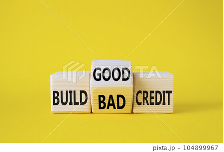 Build Good or Bad Credit symbol. Wooden cubes with words Build Bad Credit vs Build good credit. Beautiful yellow background. Business concept. Copy space Build Good or Bad Credit symbol. Wooden cubes with words Build Bad Credit vs Build good credit. Beautiful yellow background. Business concept. Copy space 104899967