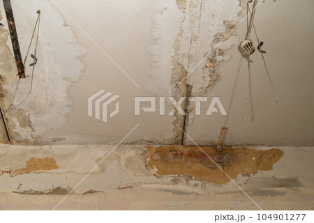 Damage ceiling from water pipelines leakage. Housing problem concept Damage ceiling from water pipelines leakage. Housing problem concept 104901277