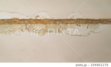 Damage ceiling from water pipelines leakage. Housing problem concept 104901278