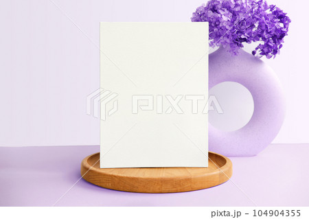 Blank Greeting Card Invitation Mockup. Front view. Dry Flowers Modern Wooden Plate, Paper Mock Up on Violet Table. Copy Space. Minimal Business Brand Template. Soft Shadow. Nordic Flier Design Ad. A6 Blank Greeting Card Invitation Mockup. Front view. Dry Flowers Modern Wooden Plate, Paper Mock Up on Violet Table. Copy Space. Minimal Business Brand Template. Soft Shadow. Nordic Flier Design Ad. A6 104904355