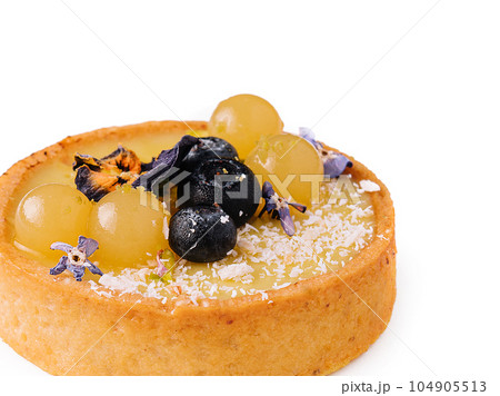 Lemon tartlet with blueberries and grapes Lemon tartlet with blueberries and grapes 104905513