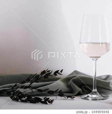 glass of white wine close up 104905648