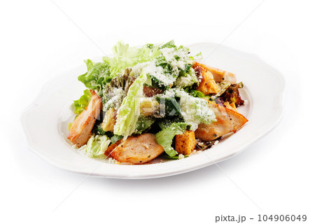 Traditional classic Caesar salad in white plate Traditional classic Caesar salad in white plate 104906049