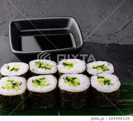 Sushi Maki rolls cucumber on stone 104906120