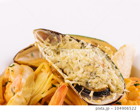 Italian Pasta with seafood isolated on white Italian Pasta with seafood isolated on white 104906522