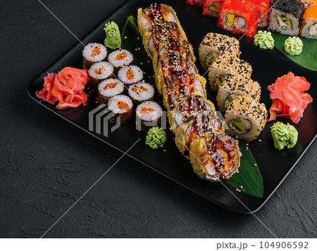 set of colorful different kinds of sushi rolls set of colorful different kinds of sushi rolls 104906592